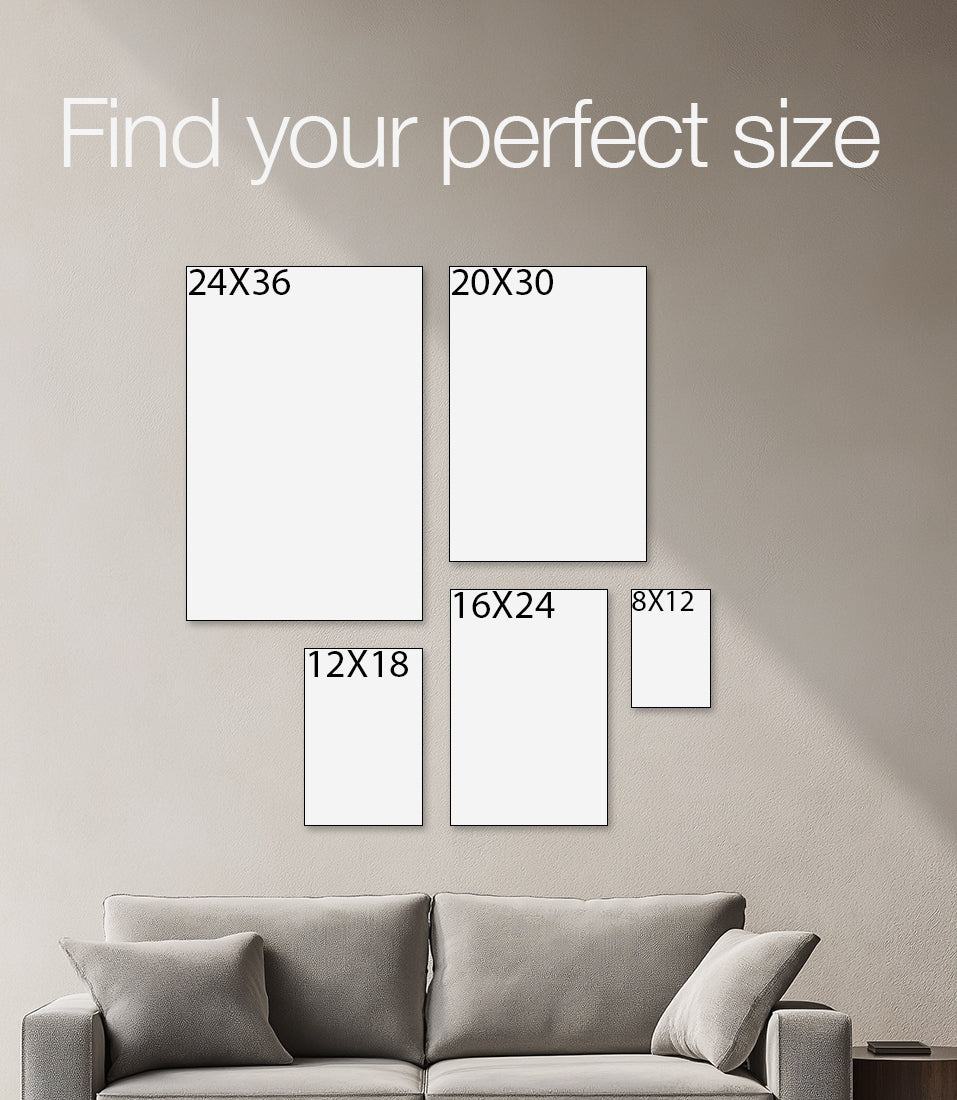Wall with framed artworks of different sizes and a gray sofa.